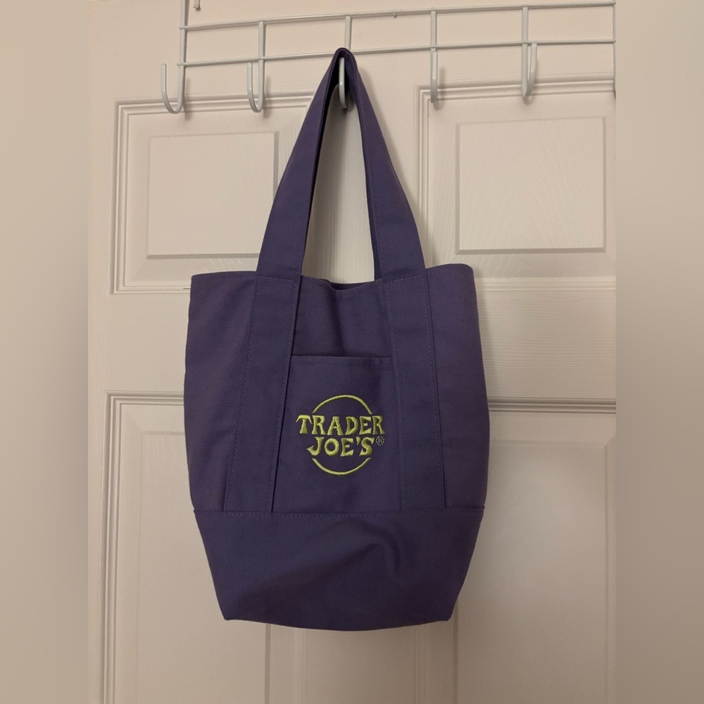 Trader Joe’s mini tote, lavender with light green embroidery, new without tags